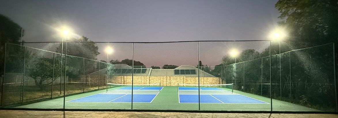 The completed Pickleball Court at The Stand, Linden &mdash; lit up at night